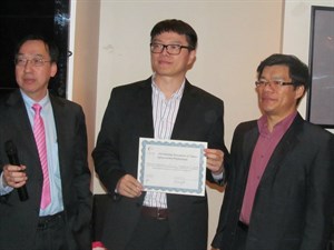 Xianming presenting award